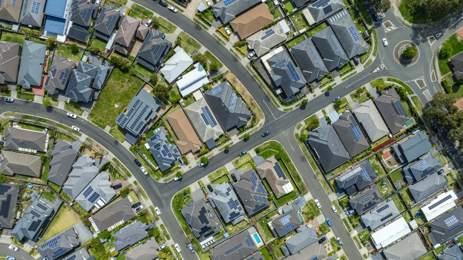Rooftops and streets of a Sydney suburb, straight down from the air